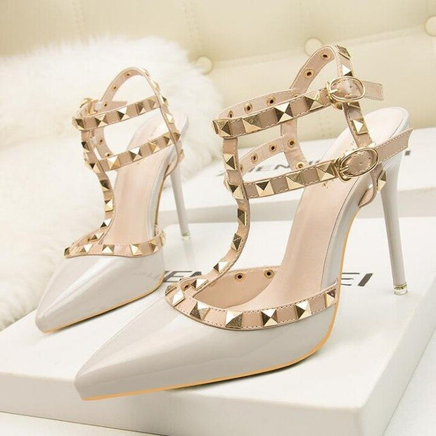 Roman fashion rivet sandals 10CM PUMPS Woman shoes Sexy nightclub stiletto heels patent-leather metallic rivet hollow